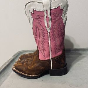 Little girl scuffed up Ariat Boots